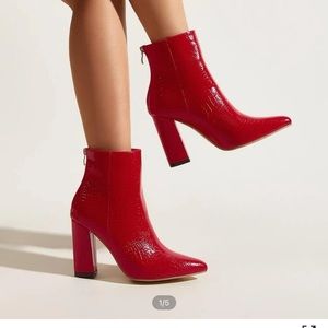 Red heeled booties never worn